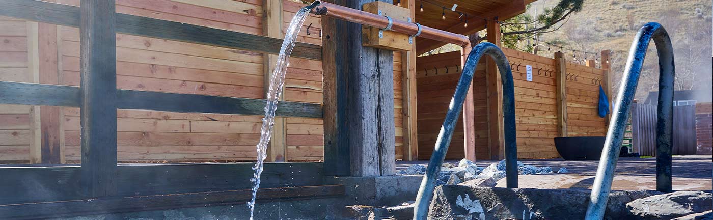 faucet pouring into a hot spring